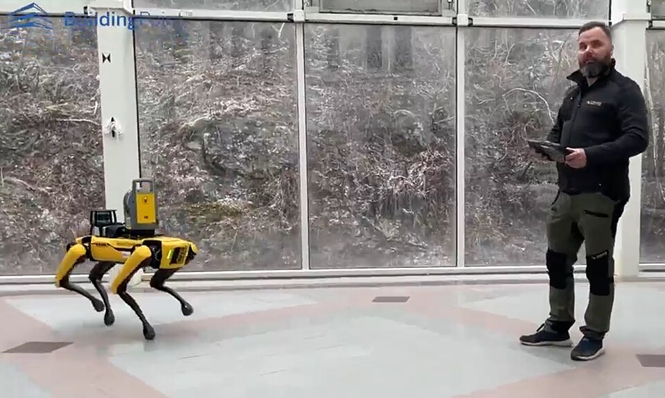 Guy steering the robot dog SPOT from Boston Dynamics