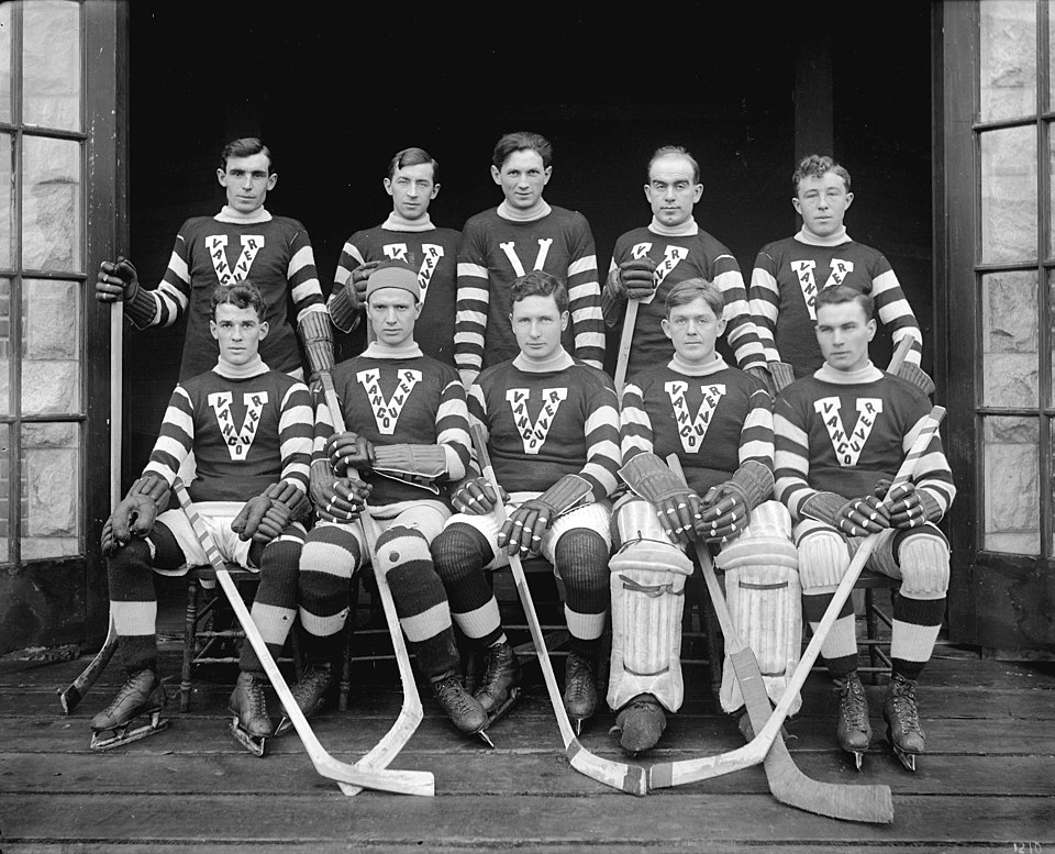 1913–14 Vancouver Millionaires. Photograph is dated from the uniform style which was unique to the 1913–14 season.Back row: Smokey Harris, Sibby Nichols, Pete Muldoon, Cyclone Taylor, Chuck ClarkFront row: Rusty Lynn, Si Griffis, Frank Patrick, Allan Parr, Frank Nighbor