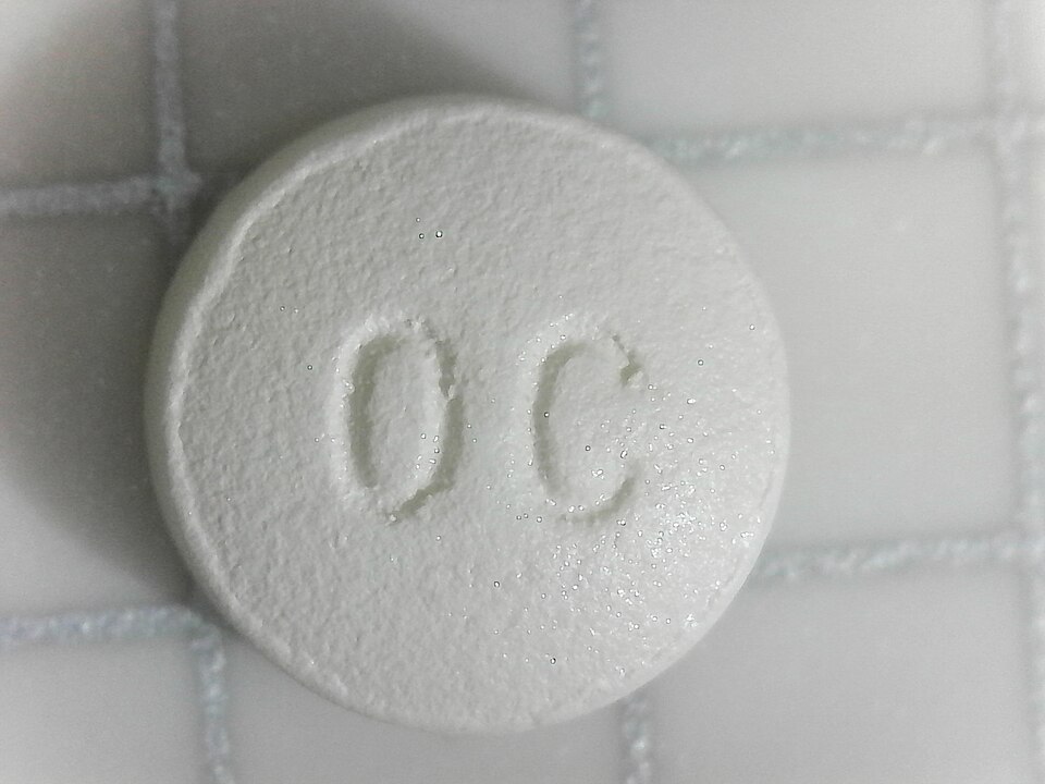 Oxycodone 10mg, "OC" facing up; the squares in the image represent one half centimeter, so the pill is around 0.75cm.This pill was taken out of a blister pack that was purchased legally, there is next to no chance that it is a counterfeit.