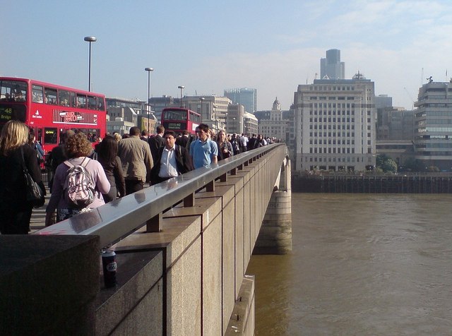 Commuters on London Bridge 8:50 on a sunny May morning, and London Bridge is packed with commuters, many having arrived at London Bridge station.