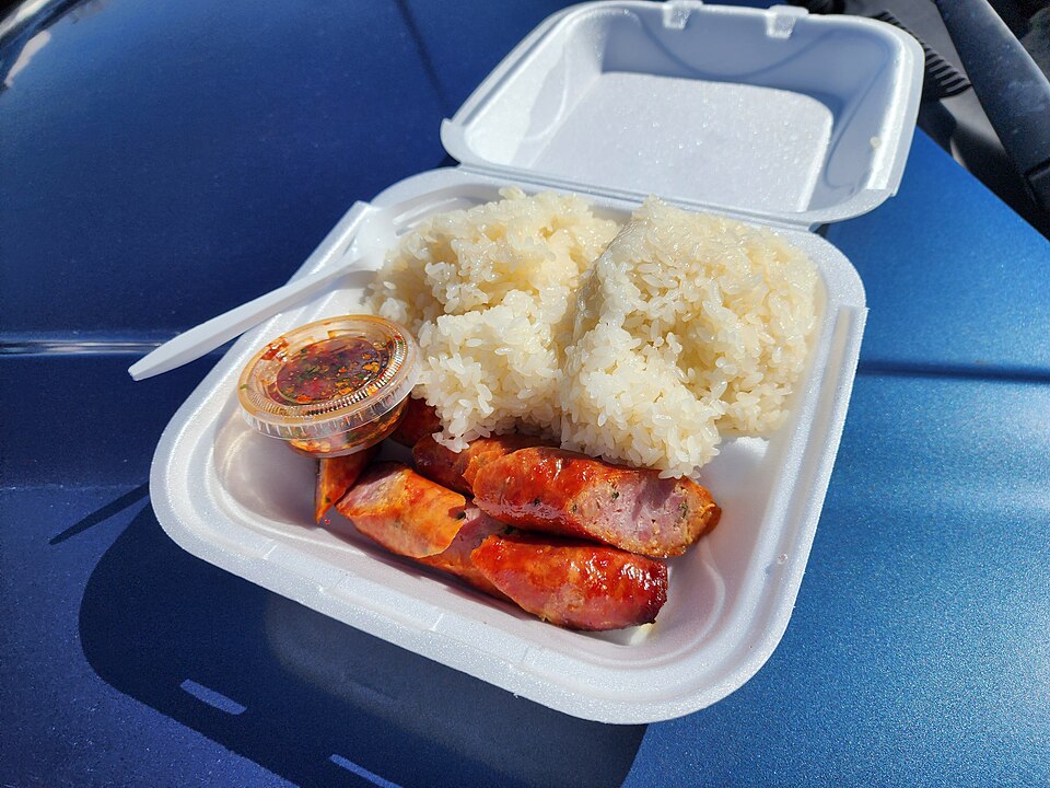 A Hmong sausage meal with sticky rice and pepper dip from a food court vendor at Hmongtown Marketplace, Saint Paul, MN.