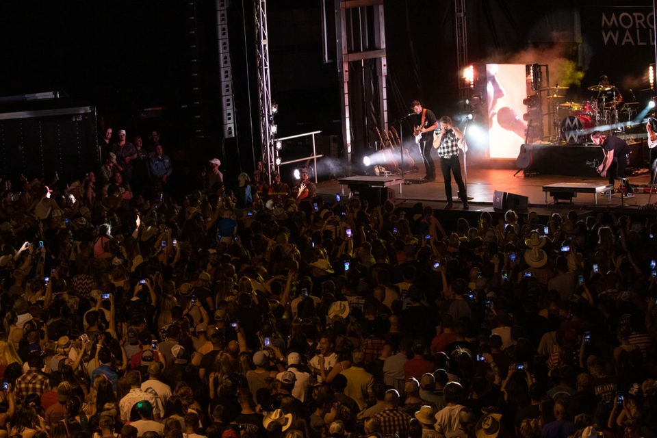 Morgan Wallen, an American country music artist performs his hit single “Whiskey Glasses” during Freedom Fest, June 28, 2019, at the Iron Horse Park, Fort Carson, Colorado. Freedom Fest was a three day festival featuring carnival rides, food trucks, concerts and fireworks in celebration of Independe