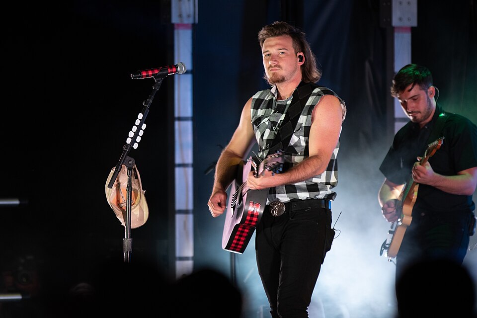 Morgan Wallen, an American country music artist performs his hit single “Whiskey Glasses” during Freedom Fest, June 28, 2019, at the Iron Horse Park, Fort Carson, Colorado.