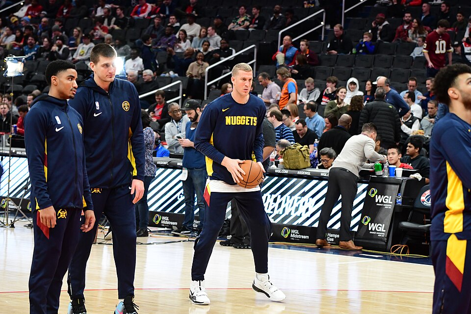 Nikola Jokic, Gary Harris, Jamal Murray and Mason Plumlee of the Denver Nuggets warming up prior to a road game against the Washington Wizards on January 4, 2020