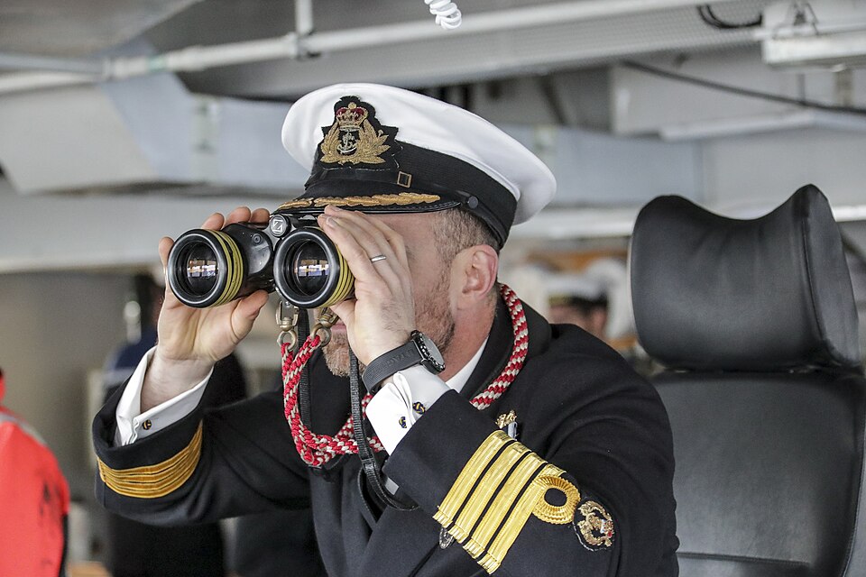 Pictured, is Flag Captain of HMS Albion using his Binoculars on the bridge as she sails back home.The assault ship sailed back home to Devonport having led Littoral Response Group (Experimentation) (LRG(X)) on a series of exercises which will help shape the Royal Navy and Royal Marines of tomorrow.W