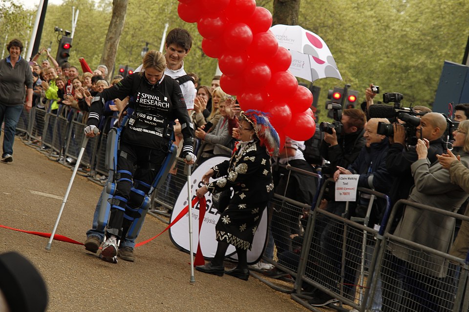 Claire Lomas crossing the finish line during her 2012 Virgin London Marathon walk