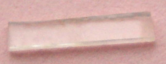a piece of single crystal of GaN, about 3 mm in length