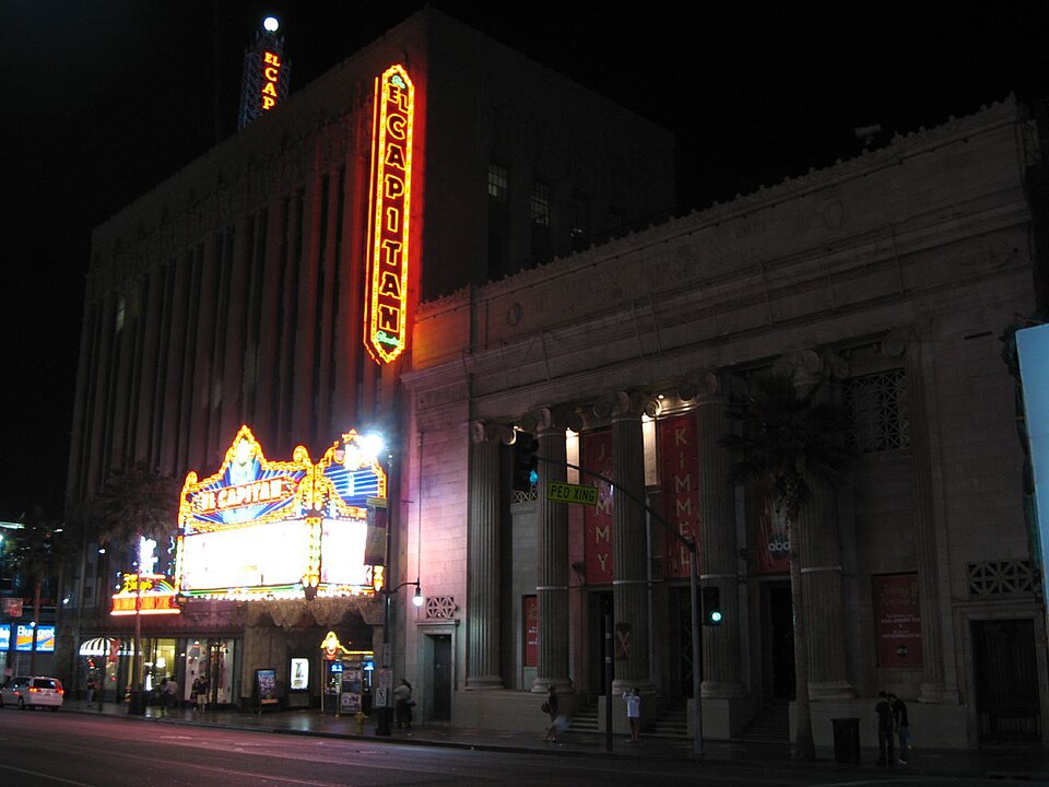 El Capitan Theatre is a fully restored movie palace at 6838 Hollywood Boulevard in Hollywood. The theater and adjacent building is owned and operated by The Walt Disney Company and as such, serves as the venue for many of the The Walt Disney Studios' film premieres. This building is now home to Jimm