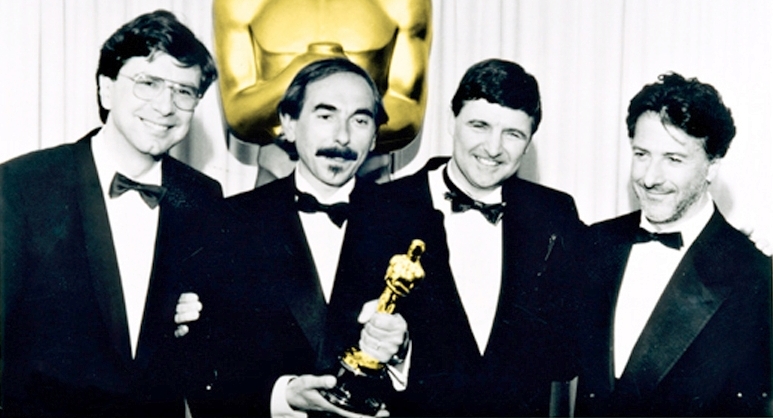 Crew of Swiss film "Journey of Hope" (original title : "Reise der Hoffnung"), produced by Condor Films, winner of the 1991 Academy Award for Best Foreign Language Film. On the right, Dustin Hoffman, who presented the award. Holding the statuette : Xavier Koller, director of the movie. The two other