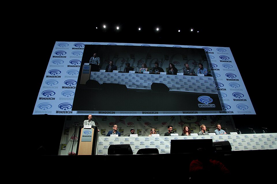 Ben Blacker, Rob Thomas, Malcolm Goodwin, Rose McIver, Rahul Kohli, Diane Roggiero-Wright, David Anders and Robert Buckley speaking at the 2015 Wondercon, for "iZombie", at the Anaheim Convention Center in Anaheim, California.

Please attribute to Gage Skidmore if used elsewhere.