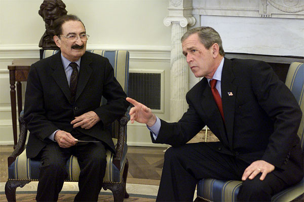 President George W. Bush and Prime Minister Bulent Ecevit of the Republic of Turkey talk with reporters in the Oval Office Wednesday, Jan. 16. Photo: Paul Morse, White House.