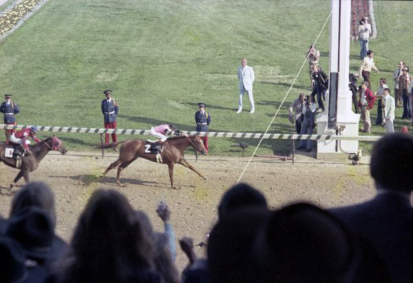 Horse sports
Horse racing--Kentucky
Kentucky Derby, Louisville, Ky
Racetracks (Horse racing)--Kentucky
Horsemen and horsewomen
Jockeys
Race horses

Affirmed (Horse) Bert Morgan was a photographer whose best-known work was his photographs of Palm Beach high society events and people taken by Morgan a