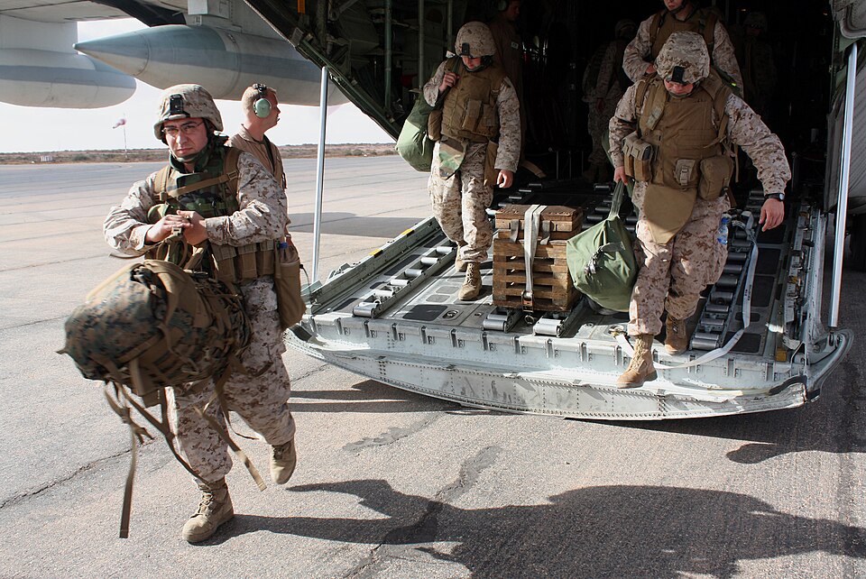 Reserve Marines and sailors from the 24th Marine Regiment debark a KC-130 aircraft at the airfield here May 28 for follow-on ground transport to nearby Cap Draa, a Moroccan training area along the country’s western coastline. About 1,000 Marines, sailors, soldiers and airmen are taking part in Afric