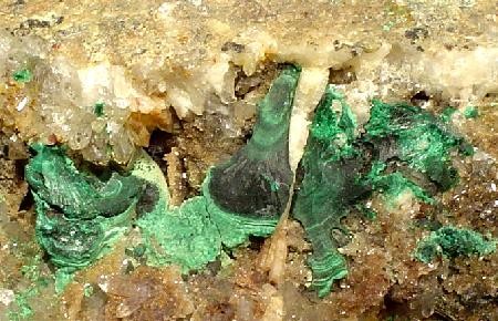 Malachite
Locality: Cheshire, New Haven County, Connecticut, USA (Locality at mindat.org)
Size: 5.3 x 4.3 x 3.7 cm.
A classic, OLD-TIME and showy specimen of banded, botryoidal malachite nicely set amidst quartz veins in matrix from Cheshire, Connecticut. Formerly in the Delaware County (Pennsylvani