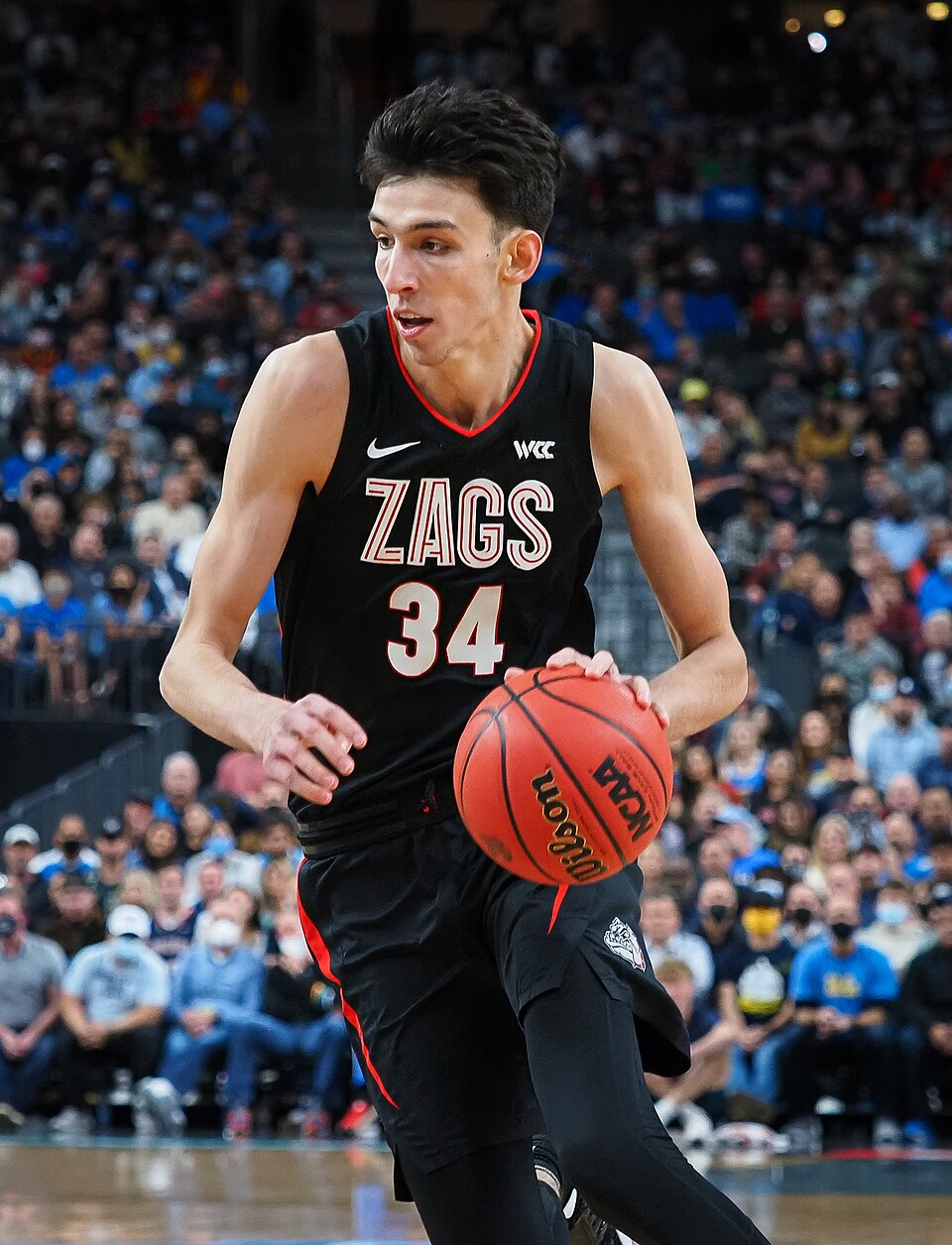 Gonzaga Bulldogs center Chet Holmgren (34) drives hard to the basket; Gonzaga defeats UCLA Basketball 83-63, November 23, 2021, Las Vegas, NV.
