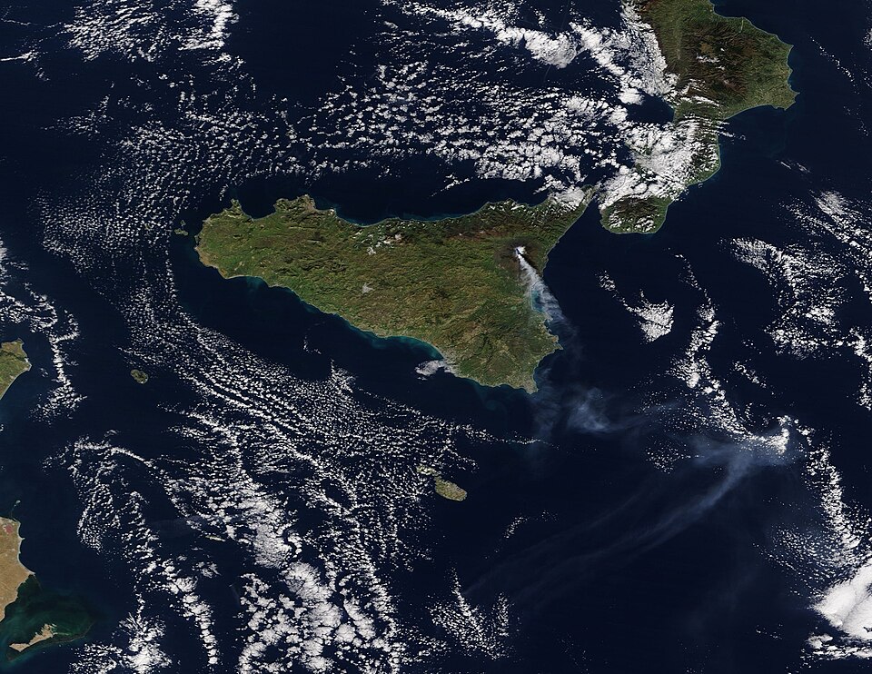A short but intense flank eruption at Italy’s Mount Etna sent a large column of ash and gas into the atmosphere on December 24. According to the Toulouse Volcanic Ash Advisory Center, the volcanic ash cloud rose up to 18,000 feet (5.5 km) above sea level. A swarm of at least 130 earthquakes accompan