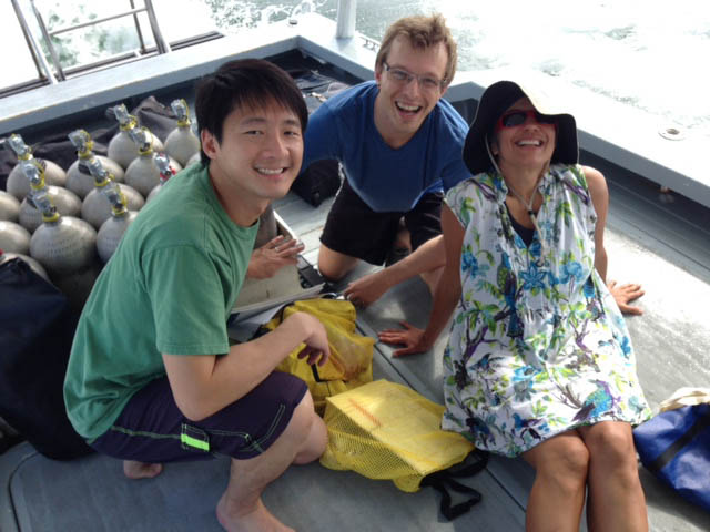 Collaborator Dr. Danwei Huang, postdoctoral researcher Jesse Zaneveld, and co-principal investigator Dr. Monica Medina on a boat to take samples of corals in Singapore. This was done as part of the Global Coral Microbiome Project, which was studying microbial populations associated with reef-buildin