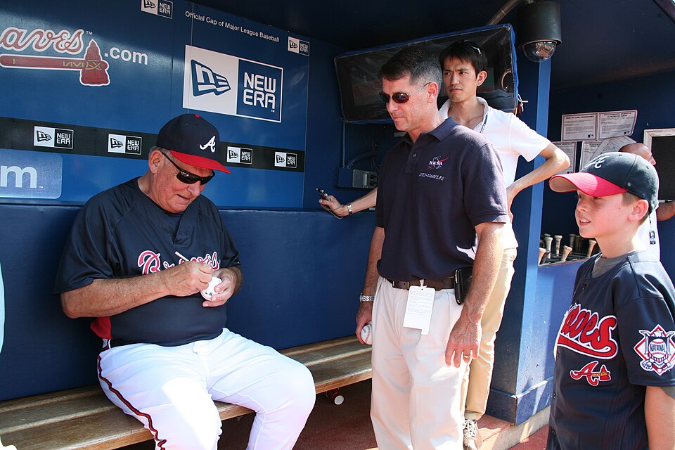 Atlanta Braves Manager Bobby Cox autographs a baseball for Army Astronaut Shane Kimbrough and his son Zack before a home game against the Boston Red Sox at Turner Field June 26. 




This image has an extracted file: Bobby Cox signs autograph CROPPED.jpg.