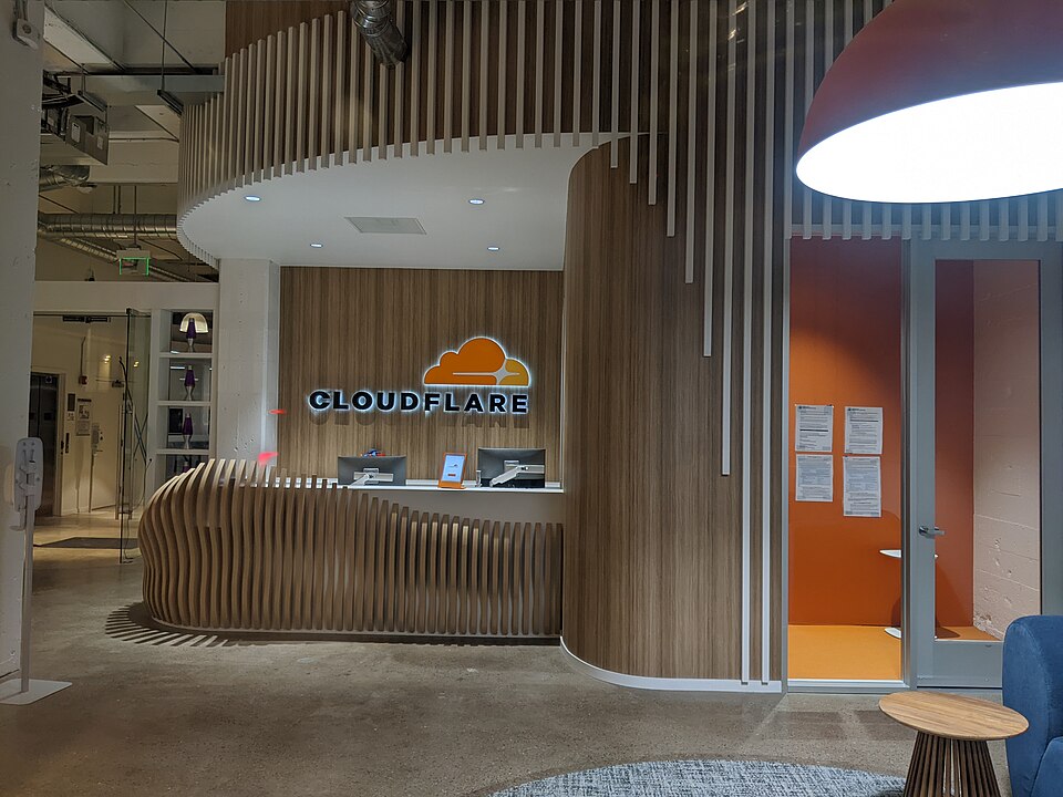 Entrance area of the Cloudflare offices at 101 Townsend Street in San Francisco (seen from the street through the window)