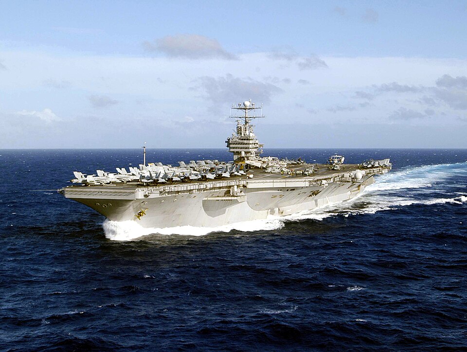 The U.S. Navy aircraft carrier USS Abraham Lincoln (CVN-72) underway in the Western Pacific on 21 December 2004. Abraham Lincoln, with assigned Carrier Air Wing 2 (CVW-2), was deployed to the Western Pacific 15 October 2004 to 4 May 2005.