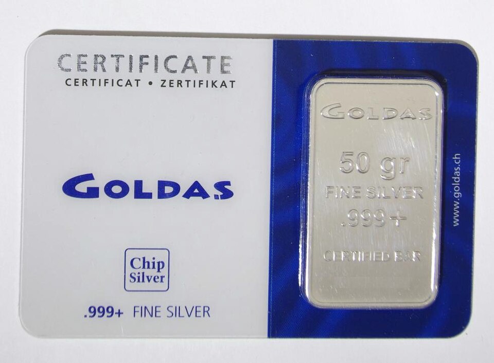 silver bullion bar with assay card
