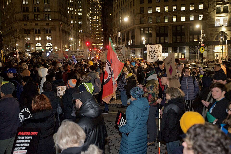 Protesters at Foley Square by the federal government building protesting the ICE killing of Renee Good hours earlier. People spoke at the monument, before walking around 26 Federal Plaza, and ending back at Foley Square.