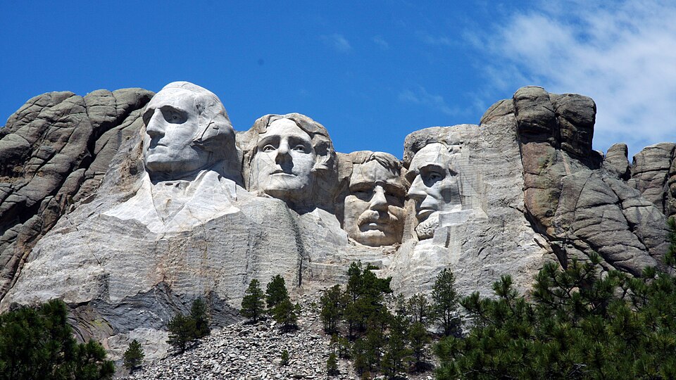 Picture of Mount Rushmore National Memorial in Keystone, South Dakota, taken from the amphitheater of the Lincoln Borglum Vistor Center.