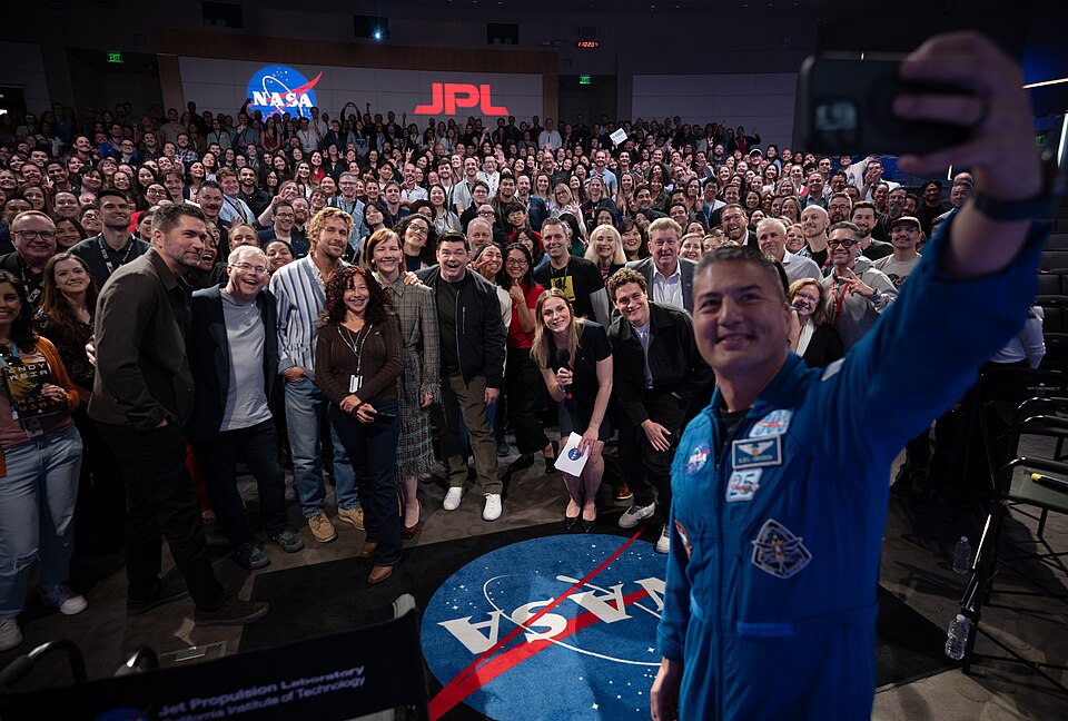 NASA astronaut and deputy director of the Flight Operations Directorate Kjell Lindgren takes a selfie with panelists and the audience at the agency’s Jet Propulsion Laboratory on Feb. 25, 2026. Actors Ryan Gosling and Sandra Huller, screenwriter Drew Goddard, directors Phil Lord and Christopher Mill