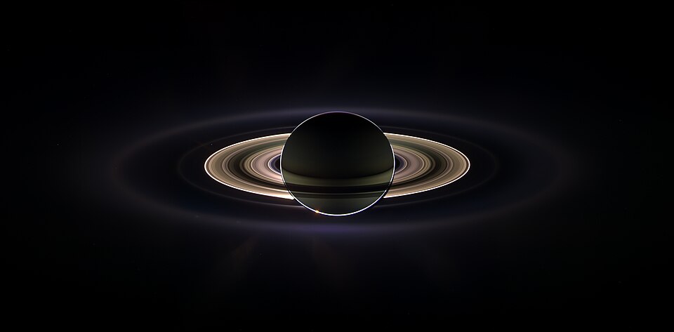 Saturn eclipsing the sun, seen from behind from the Cassini orbiter. The image is a composite assembled from images taken by the Cassini spacecraft on 15 September, 2006. Individual rings seen include (in order, starting from most distant) E ringPallene ring (visible very faintly in an arc just
