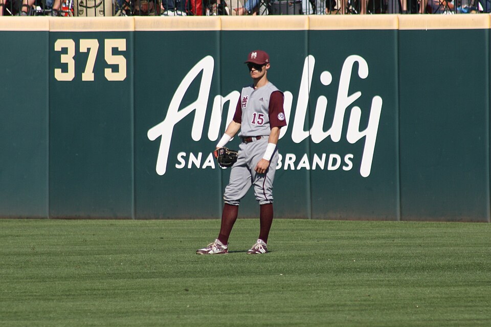 Jake Mangum plays centerfield for the Mississippi State Bulldogs against the Arkansas Razorbacks at Baum Stadium
