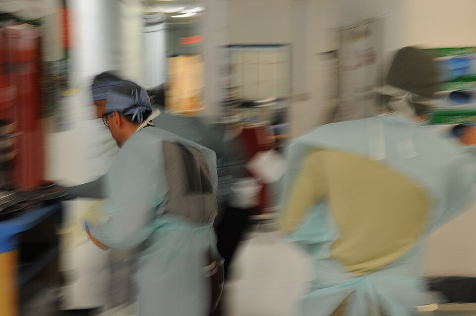 Members of the 541st Forward Sugical Team (Airborne) and Provincial Reconstruction Team (PRT) Farah treat patients in the advanced trauma life support center in preparation to move a patient to the operating room at the aid station on FOB Farah, Dec. 31.  Four members of the Afghan National Police (