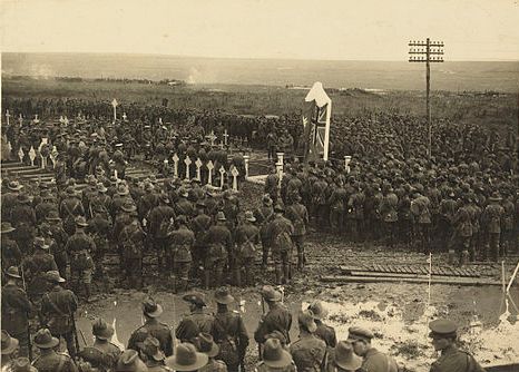 Official Photo no.EZ125, AWM exhibition no.6
Original caption reads: "An Australian Chaplian delivering the sermon at the unveiling of memorial to the 1st Australian Division, on July 8, 1917, Pozieres, in France".

Tasmanian Archives and Heritage Office: W.L. Crowther Library