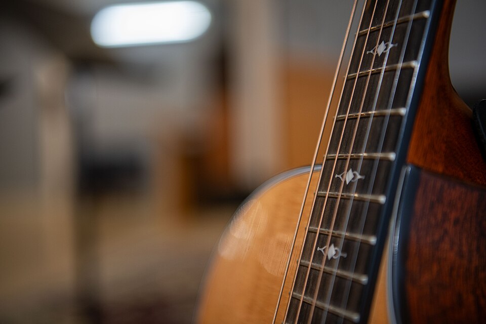 A guitar leans against the wall of the chapel within the U.S. Central Command area of responsibility, July 10, 2025. Religious Affairs offers counseling and guidance to service members experiencing stress or mental fatigue following traumatic events. Services include privileged communication with a