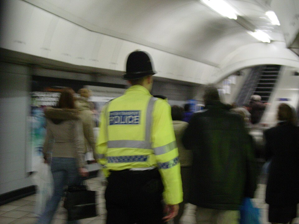 A British Transport Police officer patrols the London Underground