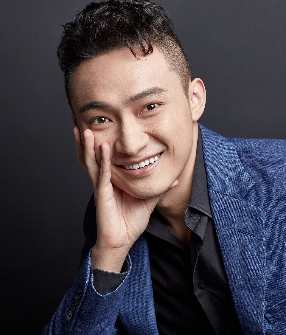 Professional headshot of Justin Sun