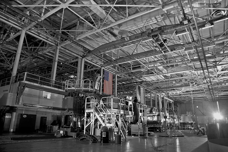 An American flag hangs in SpaceX headquarters in Hawthorne, California. Credit: SpaceX