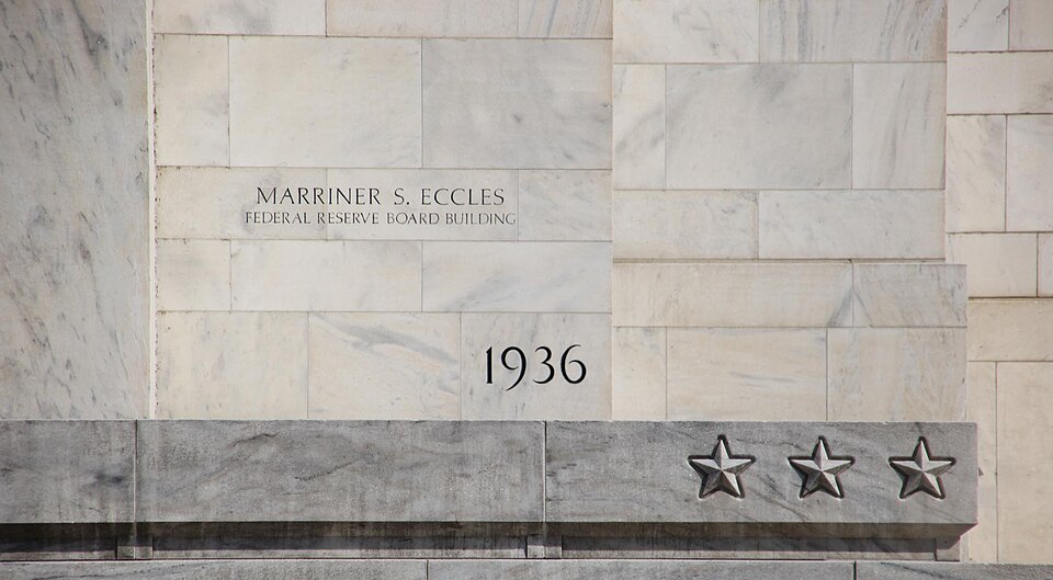 Cornerstone and steps emblazoned with stars to the right of the ceremonial main entrance to the United States Federal Reserve Building (the Marriner S. Eccles Federal Reserve Board Building) in Washington, D.C., in the United States. The Neoclassical building was designed Paul Philippe Cret in 1935,