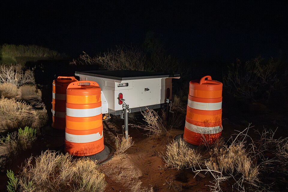 Automated license plate reader (ALPR) system on the north side of New Mexico State Road 9 about 1,000 ft west of the Santa Teresa Border Patrol Station in Santa Teresa, New Mexico. Photographed in May 2024.