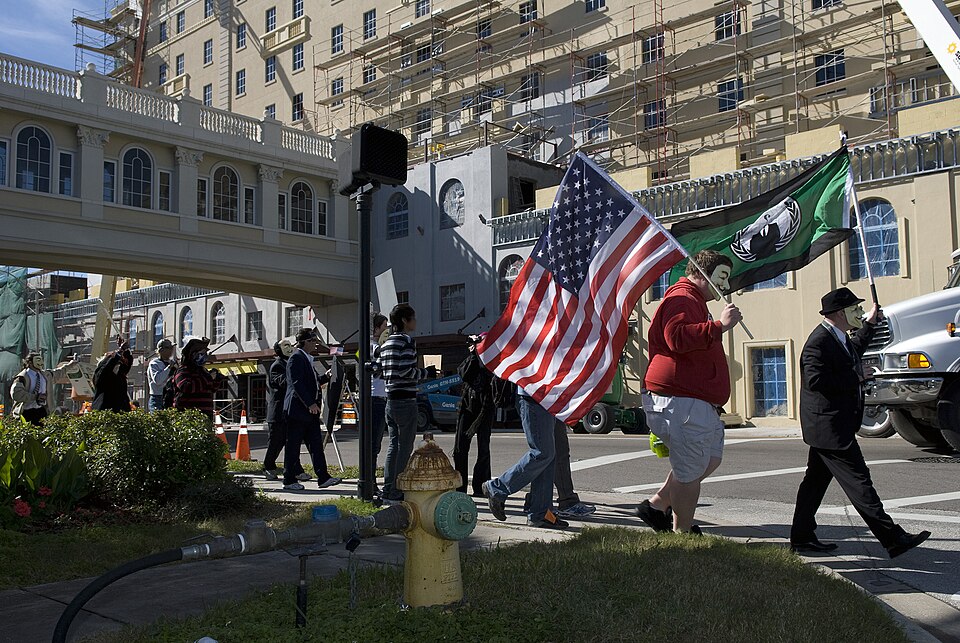The scientology cult's Fort Harrison building in the background is currently undergoing renovations.  Anonymous protesters regularly get signs of support from the construction workers performing the job.January 17, 2009 in Clearwater, Florida was the  first "Anoniversary" celebration of Chanology.