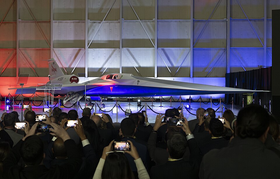 NASA and Lockheed Martin publicly unveil the X-59 quiet supersonic research aircraft at a ceremony in Lockheed Martin’s Skunk Works facility in Palmdale, California. The X-59 is the centerpiece of NASA’s Quesst mission, which seeks to solve one of the major barriers to supersonic flight over land, c