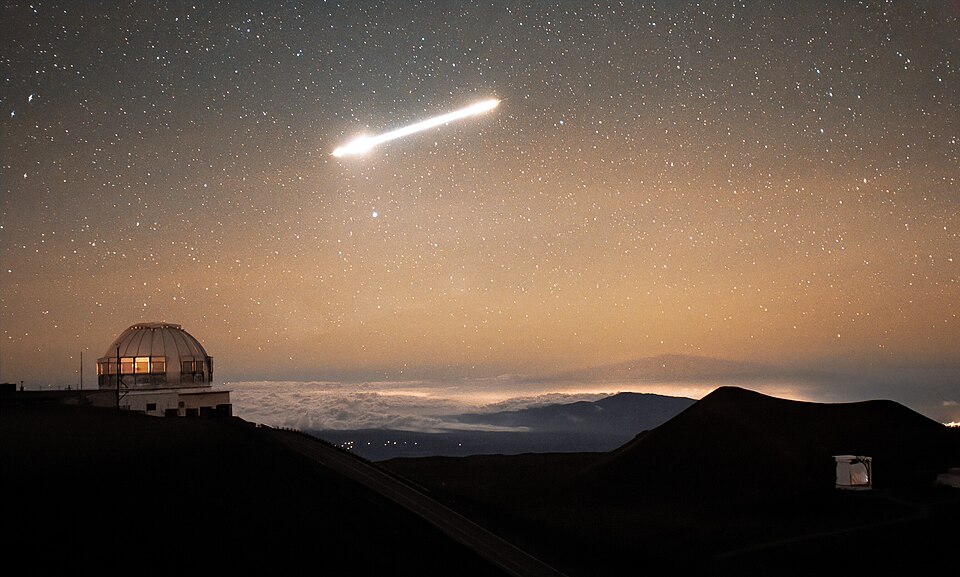 In the pale orange sky above Gemini North, a blazing rock shoots through the atmosphere as observed by a Gemini North Cloudcam. Gemini North is one half of the International Gemini Observatory, funded in part by the U.S. National Science Foundation (NSF) and operated by NSF NOIRLab.The object soarin