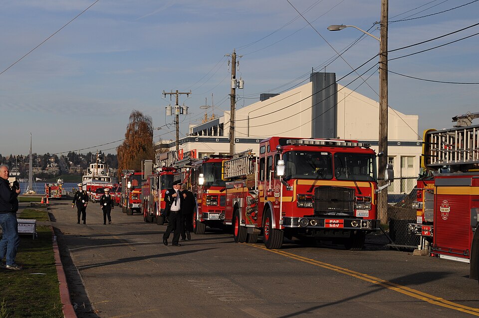 Seattle Fire Department vehicles outside the former Naval Reserve Building, South Lake Union, Seattle, Washington during a memorial for Battalion Chief David H. Jacobs, Jr.