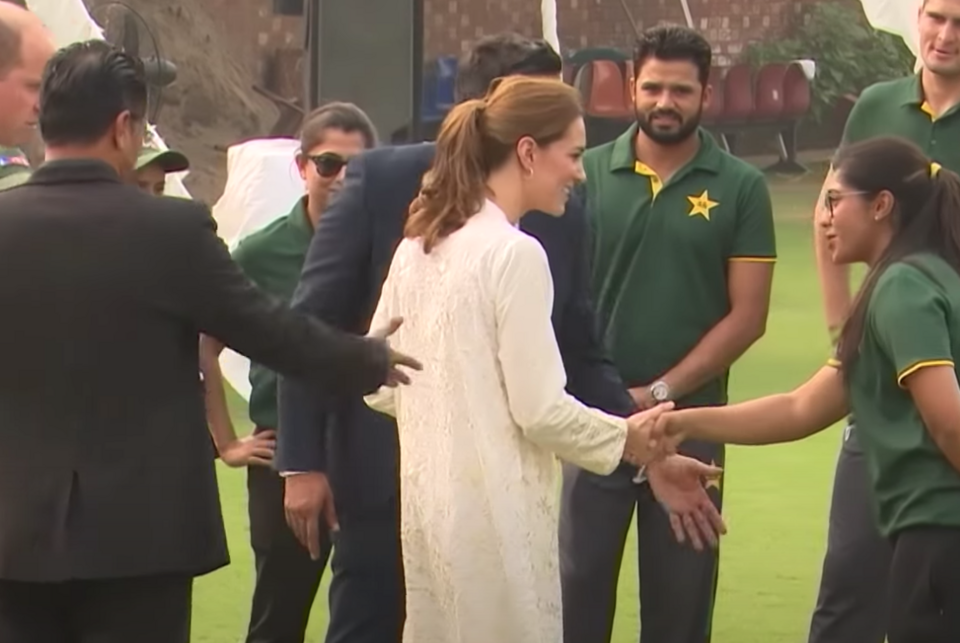 The Duchess of Cambridge greets locals in Pakistan in 2019 after a cricket game.