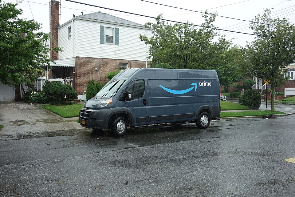 A Ram ProMaster Amazon Prime delivery van parked at 81st Avenue and 169th Street in Hillcrest, Queens.