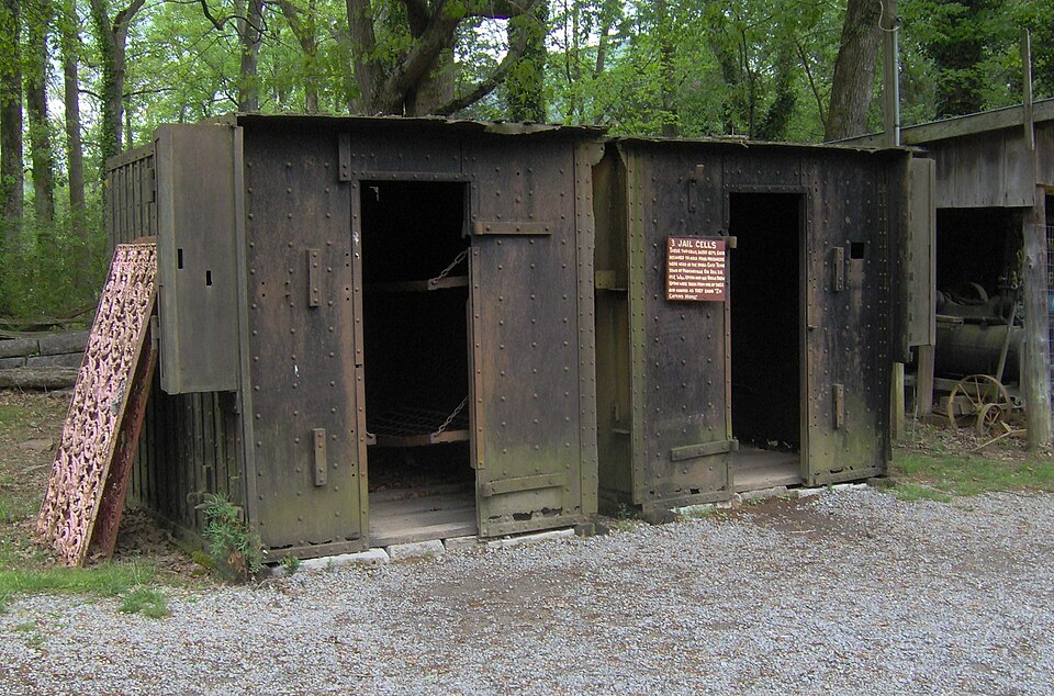 Late 19th-century jail cells on display at the Museum of Appalachia in Norris, Tennessee, USA.  Built in 1874, the cells were 6ft x 9ft and each housed 4 inmates.  They were originally located in Madisonville, Tennessee.