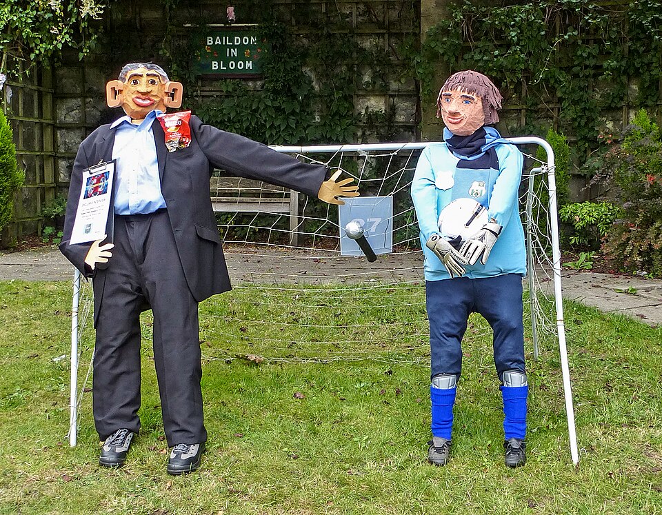 Baildon Scarecrow Festival 2013, in Baildon, West Yorkshire, England. Match of the Day.