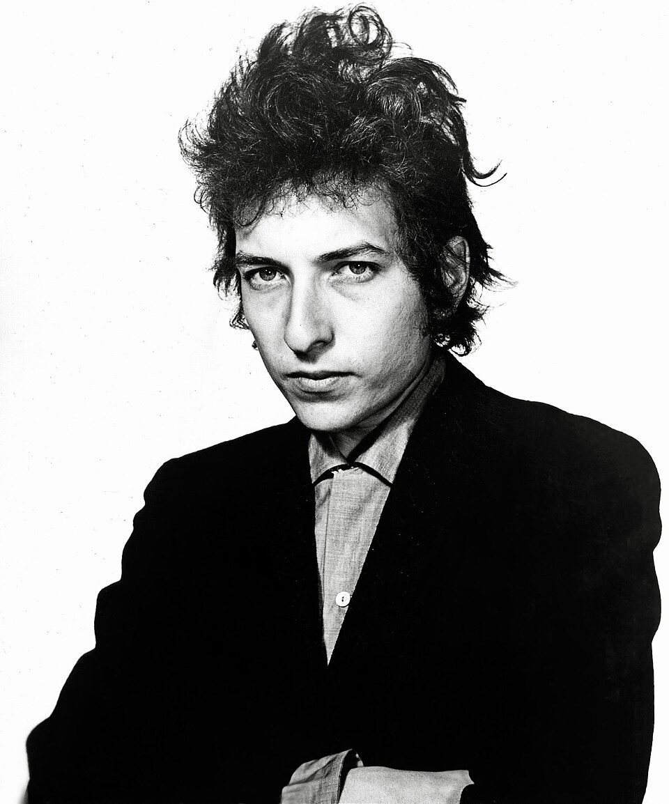 Bob Dylan in a 1965 publicity photo taken by Daniel Kramer. The photo was issued by Albert Grossman Management (ABGM), created by Dylan's manager Albert Grossman.
