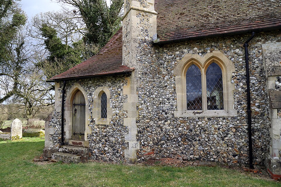 St John the Evangelist's Church, Bush End, Hatfield Broad Oak, Essex, England ~ buttressed vestry and vestry door at the north of the chancel