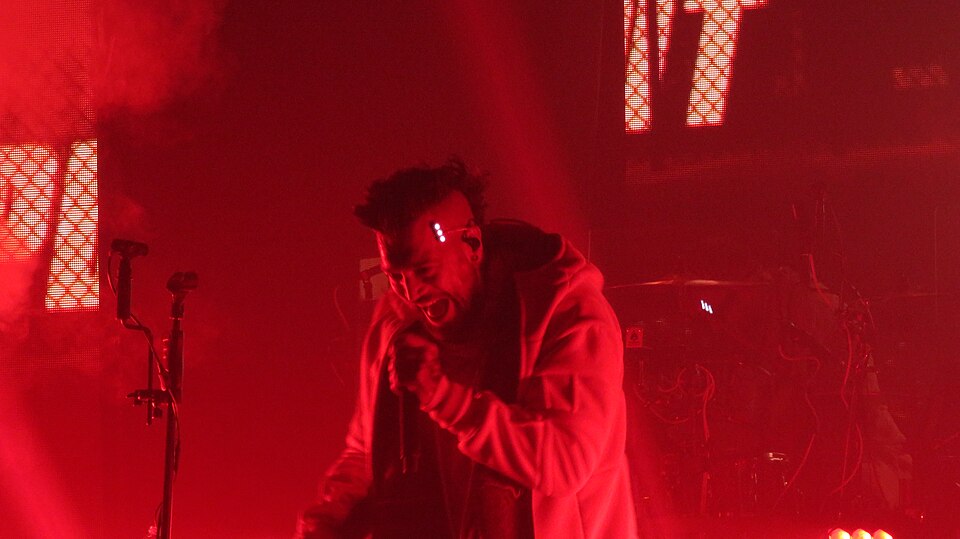 A shot of Starset vo. Dustin Bates screaming during a performance at Columbus OH, 11/26/2021.