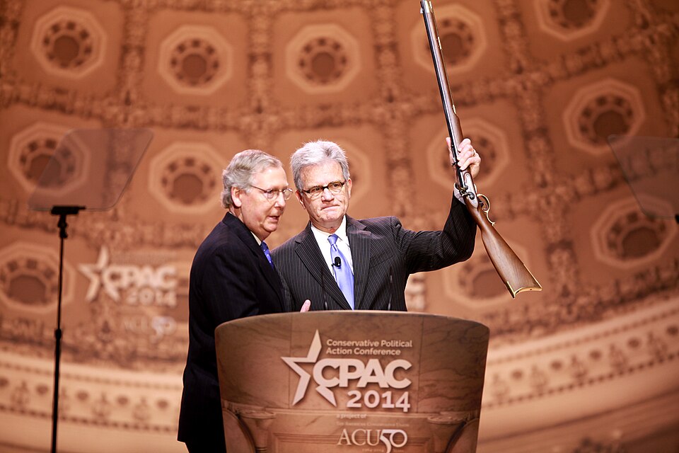 Senators Mitch McConnell of Kentucky presenting Tom Coburn of Oklahoma a gun at the 2014 Conservative Political Action Conference (CPAC) in National Harbor, Maryland.
Please attribute to Gage Skidmore if used elsewhere.